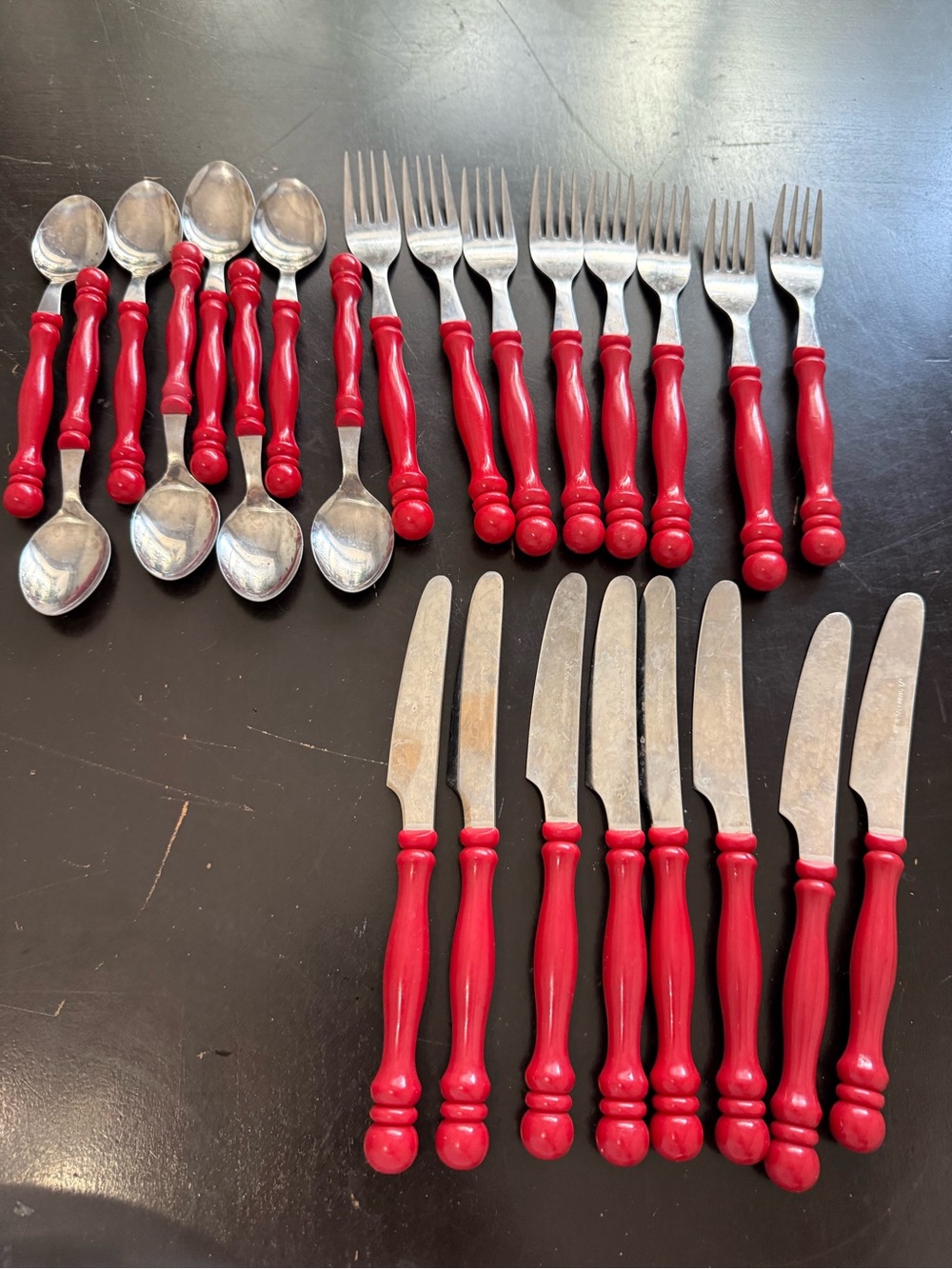 Red handled silverware lot of 24